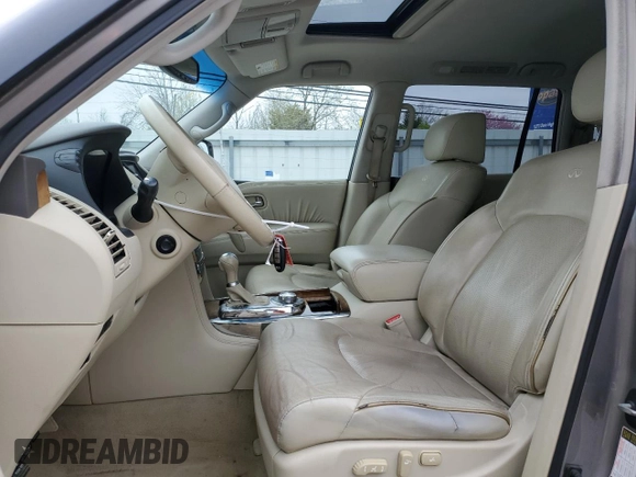 2012 Infiniti QX56 7-passenger z VIN JN8AZ2NE4C9017723, wystawiony jako Copart lot #44863515 z przebiegiem 130 033 mil mil oraz Czysty tytuł • Clean title. Historia ofert i sprzedaży dostępna na DreamBid. Obrazek 7.