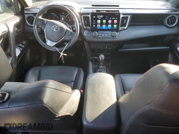2018 Toyota RAV4 Hybrid SE with VIN JTMJJREV5JD210274, listed as a Copart auction lot 52450645 with 108,249 mi miles and Salvage title. Bid and sale history available at DreamBid. Image 8.