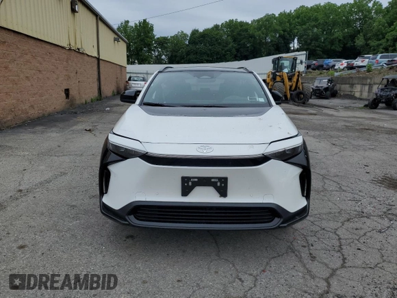 2024 Toyota bZ4X XLE with VIN JTMABACA2RA087660, listed as a Copart auction lot 61295995 with 2,288 mi miles and Salvage title. Bid and sale history available at DreamBid. Image 5.