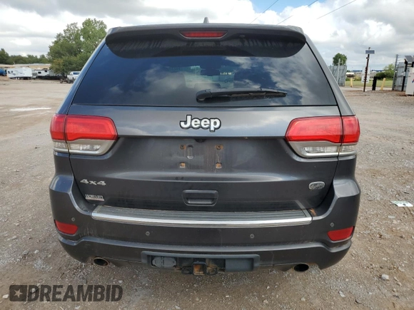 2015 Jeep Grand Cherokee Overland with VIN 1C4RJFCT4FC813510, listed as a Copart auction lot 41466395 with 135,124 mi miles and Salvage Title. Bid and sale history available at carsss.com. Image 6.