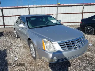 2009 Cadillac DTS w/1SA with VIN 1G6KD57Y29U108005, listed as a IAAI auction lot 41970513 with 133,344 mi miles. Bid and sale history available at carsss.com. Image 1.