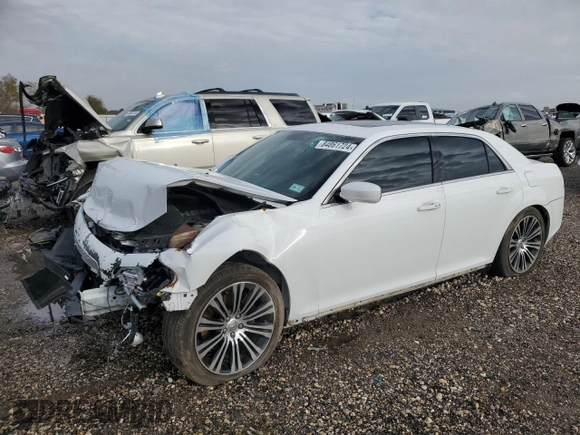 2013 Chrysler 300 with VIN 2C3CCABT0DH691022, listed as a Copart auction lot 84861724 with 124,518 mi miles and Salvage Title. Bid and sale history available at carsss.com. Image 1.