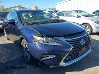 2017 Lexus ES 300h with VIN JTHBW1GG2H2142462, listed as a IAAI auction lot 41861716 with 73,449 mi miles and . Bid and sale history available at DreamBid. Image 1.
