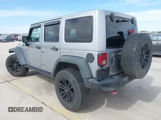 2015 Jeep Wrangler Unlimited Rubicon Hard Rock с VIN 1C4HJWFG6FL762537, выставлен на аукционе IAAI как лот 41792066 с пробегом 125 829 миль миль и . История ставок и продаж доступна на DreamBid. Изображение 3.