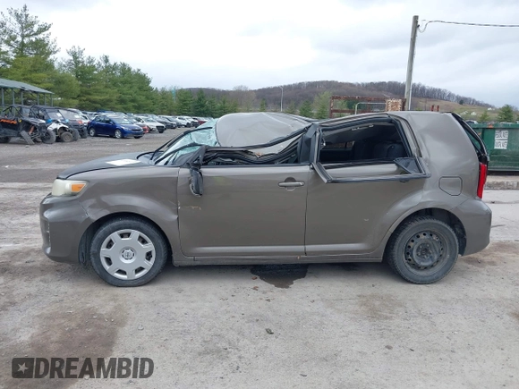 2014 Scion xB with VIN JTLZE4FE9EJ050596, listed as a IAAI auction lot 41884572 with 141,896 mi miles. Bid and sale history available at carsss.com. Image 14.
