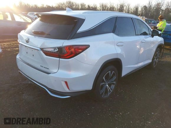 2018 Lexus RX 350L Premium z VIN JTJDZKCA2J2009731, wystawiony jako IAAI lot #41387529 z przebiegiem 67 037 mil mil oraz . Historia ofert i sprzedaży dostępna na DreamBid. Obrazek 4.