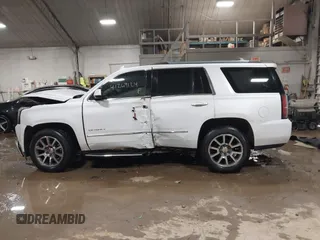 2016 GMC Yukon Denali with VIN 1GKS2CKJXGR271605, listed as a IAAI auction lot 41269124 with 172,432 mi miles. Bid and sale history available at carsss.com. Image 14.