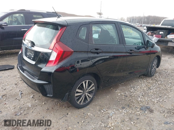 2015 Honda Fit EX-L with VIN 3HGGK5H85FM762070, listed as a IAAI auction lot 42136426 with 84,223 mi miles and . Bid and sale history available at DreamBid. Image 4.