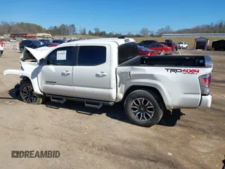2022 Toyota Tacoma SR with VIN 3TMCZ5AN4NM470000, listed as a IAAI auction lot 41629818 with 78,138 mi miles and . Bid and sale history available at DreamBid. Image 13.