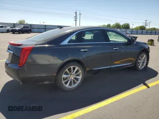 2013 Cadillac XTS Luxury with VIN 2G61R5S32D9216672, listed as a Copart auction lot 58392955 with 94,272 mi miles and Salvage title. Bid and sale history available at DreamBid. Image 3.