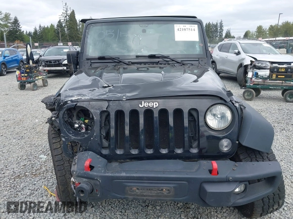 2015 Jeep Wrangler Unlimited Rubicon Hard Rock with VIN 1C4HJWFG6FL757421, listed as a IAAI auction lot 42107514 with 63,997 mi miles and . Bid and sale history available at DreamBid. Image 13.