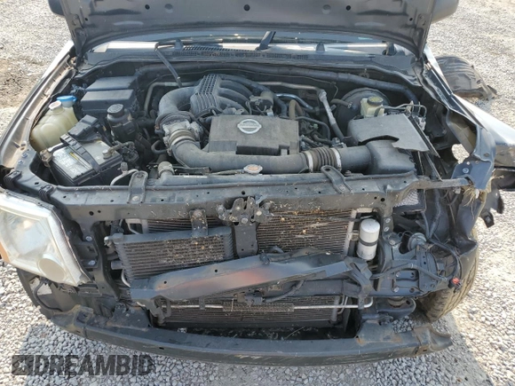2015 Nissan Xterra Pro-4X z VIN 5N1AN0NWXFN664591, wystawiony jako Copart lot #60423525 z przebiegiem 246 477 mil mil oraz Szkoda całkowita • Salvage title. Historia ofert i sprzedaży dostępna na DreamBid. Obrazek 11.