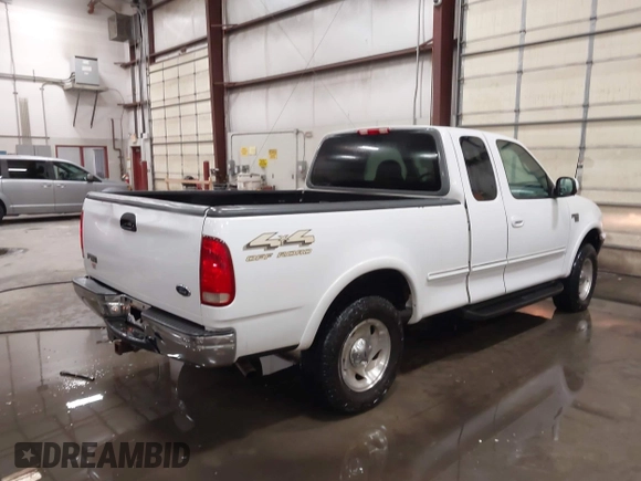 1998 Ford F-150 с VIN 1FTRX18L1WKB99239, выставлен на аукционе IAAI как лот 41987823 с пробегом 217 930 миль миль и . История ставок и продаж доступна на DreamBid. Изображение 4.