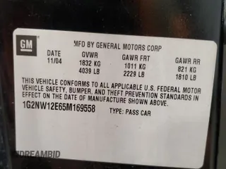2005 Pontiac Grand Am GT with VIN 1G2NW12E65M169558, listed as a Copart auction lot 86589794 with 0 mi miles and Salvage Title. Bid and sale history available at carsss.com. Image 14.