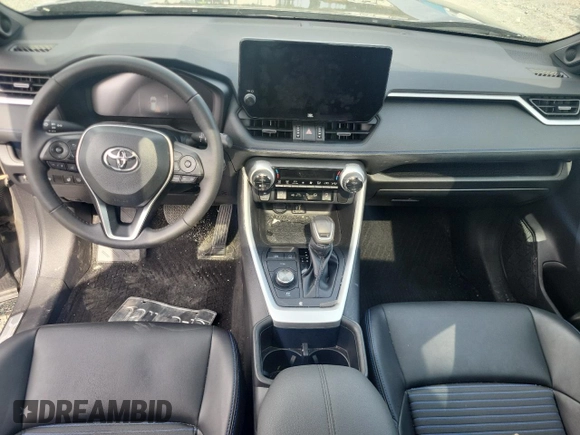 2023 Toyota RAV4 Hybrid XSE with VIN 2T35WRFVXPW176393, listed as a Copart auction lot 58304415 with 50,998 mi miles and Salvage title. Bid and sale history available at DreamBid. Image 8.