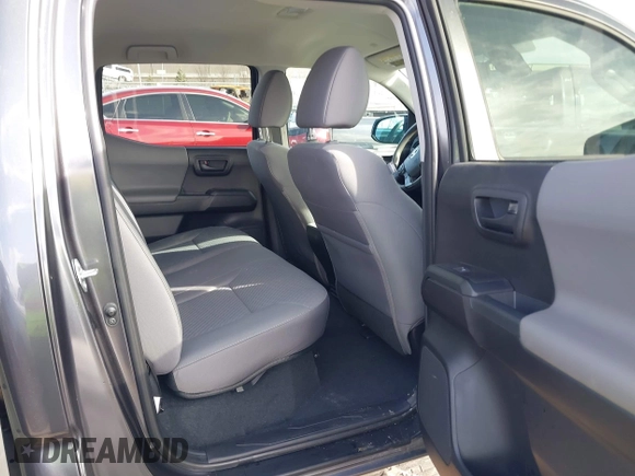 2021 Toyota Tacoma SR z VIN 3TMCZ5AN5MM377663, wystawiony jako IAAI lot #41726696 z przebiegiem 32 125 mil mil oraz . Historia ofert i sprzedaży dostępna na DreamBid. Obrazek 8.