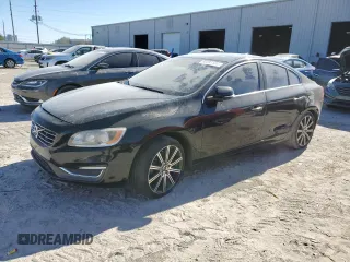 2015 Volvo S60 T5 Drive-E Platinum with VIN YV140MFD6F2301849, listed as a Copart auction lot 82231124 with Not Provided miles and Clean Title. Bid and sale history available at carsss.com. Image 1.