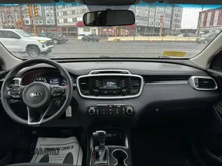 2016 Kia Sorento LX with VIN 5XYPGDA5XGG142632, listed as a IAAI auction lot 42143508 with 146,966 mi miles. Bid and sale history available at carsss.com. Image 11.