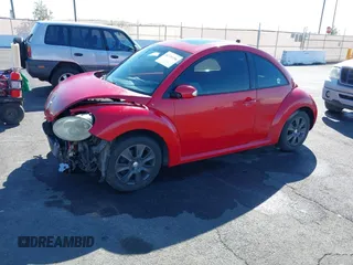 2009 Volkswagen New Beetle Coupe S with VIN 3VWRG31C39M505244, listed as a IAAI auction lot 41733256 with 166,856 mi miles. Bid and sale history available at carsss.com. Image 2.