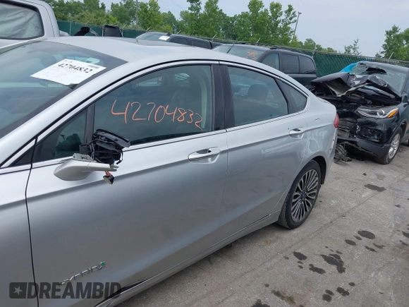 2017 Ford Fusion Hybrid Titanium с VIN 3FA6P0RU5HR181755, выставлен на аукционе IAAI как лот 42704832 с пробегом 152 688 миль миль и . История ставок и продаж доступна на DreamBid. Изображение 14.