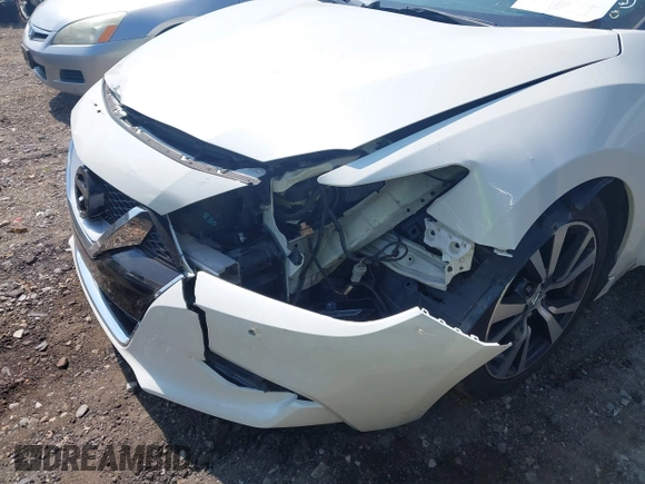 2017 Nissan Maxima S with VIN 1N4AA6APXHC371182, listed as a IAAI auction lot 42596000 with 159,710 mi miles and . Bid and sale history available at DreamBid. Image 6.