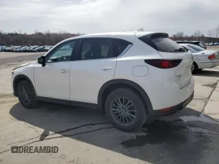 2021 Mazda CX-5 Touring z VIN JM3KFBCM9M1386068, wystawiony jako Copart lot #51735225 z przebiegiem 68 728 mil mil oraz Szkoda całkowita • Salvage title. Historia ofert i sprzedaży dostępna na DreamBid. Obrazek 2.