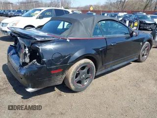 2000 Ford Mustang with VIN 1FAFP444XYF181018, listed as a IAAI auction lot 41943486 with 212,996 mi miles. Bid and sale history available at carsss.com. Image 4.