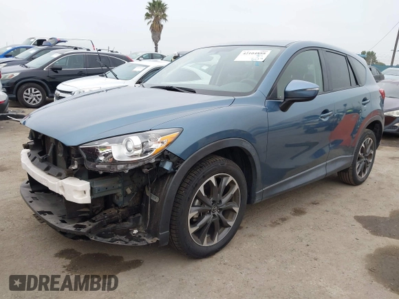 2016 Mazda CX-5 Grand Touring with VIN JM3KE2DY7G0875678, listed as a IAAI auction lot 42104888 with 30,566 mi miles. Bid and sale history available at carsss.com. Image 20.