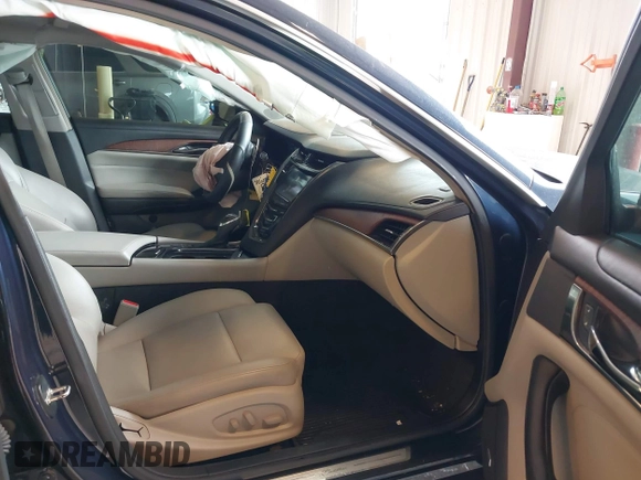 2015 Cadillac CTS AWD z VIN 1G6AW5SXXF0136481, wystawiony jako IAAI lot #42173024 z przebiegiem 128 984 mil mil oraz . Historia ofert i sprzedaży dostępna na DreamBid. Obrazek 5.