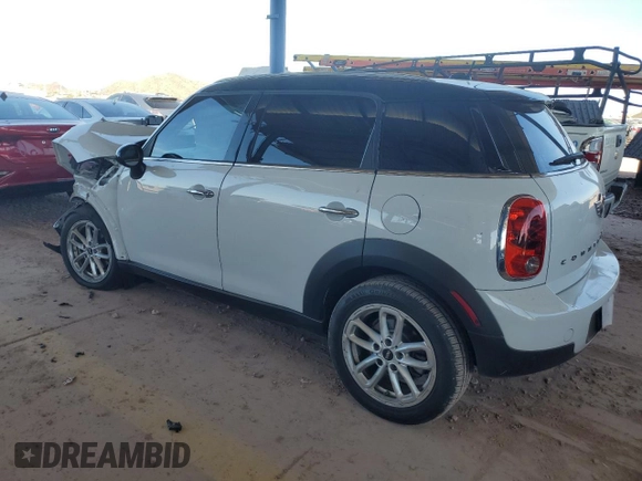 2015 MINI Countryman with VIN WMWZB3C50FWR45253, listed as a Copart auction lot 63608655 with 123,701 mi miles and Salvage title. Bid and sale history available at DreamBid. Image 2.