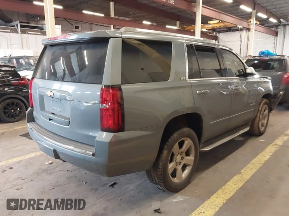 2016 Chevrolet Tahoe LTZ with VIN 1GNSKCKC3GR346276, listed as a IAAI auction lot 41646214 with 102,625 mi miles and . Bid and sale history available at DreamBid. Image 4.