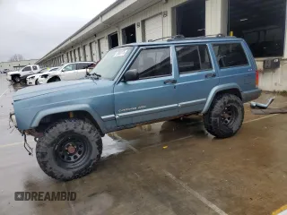 1999 Jeep Cherokee Sport z VIN 1J4FF68S4XL583029, wystawiony jako Copart lot #52030175 z przebiegiem 294 502 mil mil oraz Szkoda całkowita • Salvage title. Historia ofert i sprzedaży dostępna na DreamBid. Obrazek 1.