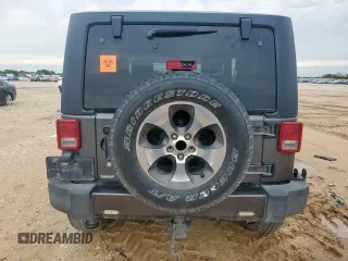 2017 Jeep Wrangler Sahara with VIN 1C4AJWBG4HL670837, listed as a Copart auction lot 60639525 with 153,049 mi miles and Salvage title. Bid and sale history available at DreamBid. Image 6.