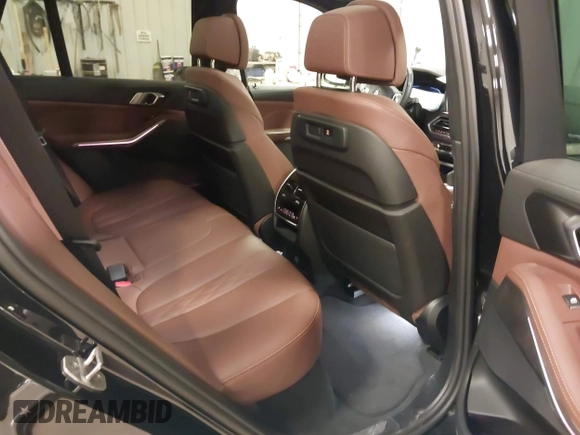 2023 BMW X5 xDrive40i with VIN 5UXCR6C08P9R88991, listed as a IAAI auction lot 41965881 with 33,136 mi miles. Bid and sale history available at carsss.com. Image 8.