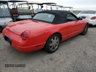 2003 Ford Thunderbird Deluxe z VIN 1FAHP60A43Y111849, wystawiony jako Copart lot #76742564 z przebiegiem Nie podano mil oraz Szkoda całkowita • Salvage title. Historia ofert i sprzedaży dostępna na DreamBid. Obrazek 3.