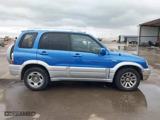 2004 Suzuki Grand Vitara with VIN JS3TE62V544100539, listed as a IAAI auction lot 41900314 with 192,776 mi miles. Bid and sale history available at carsss.com. Image 13.