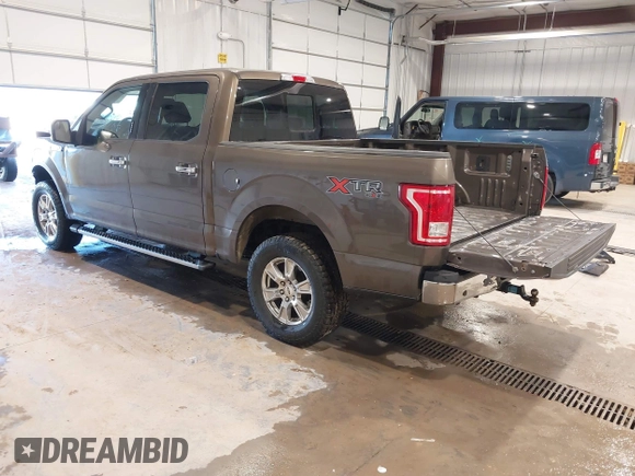 2015 Ford F-150 XLT with VIN 1FTEW1EFXFFB14990, listed as a IAAI auction lot 41681520 with 121,255 mi miles. Bid and sale history available at carsss.com. Image 3.