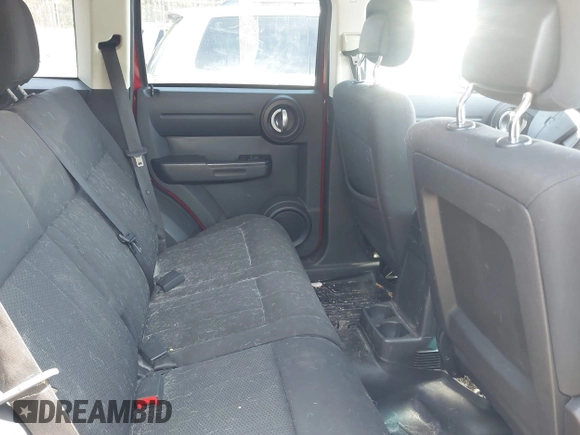 2011 Dodge Nitro Heat with VIN 1D4PU4GK2BW514520, listed as a IAAI auction lot 41919743 with 128,702 mi miles. Bid and sale history available at carsss.com. Image 8.