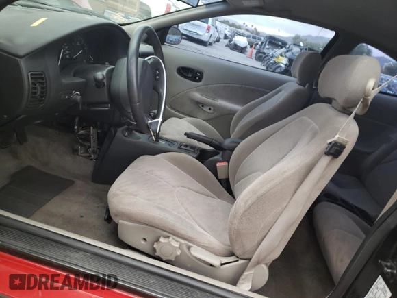 2001 Saturn SC z VIN 1G8ZY12701Z201761, wystawiony jako Copart lot #76792804 z przebiegiem 85 352 mil mil oraz Szkody całkowita. Historia ofert i sprzedaży dostępna na DreamBid. Obrazek 7.