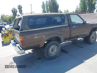 1989 Toyota Pickup DX with VIN JT4RN01PXK7010307, listed as a IAAI auction lot 42212229 with 389,623 mi miles and . Bid and sale history available at DreamBid. Image 4.