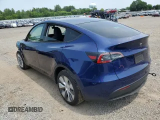 2024 Tesla Model Y Long Range z VIN 7SAYGDEE8RA248635, wystawiony jako Copart lot #59130125 z przebiegiem 21 210 mil mil oraz Szkoda całkowita • Salvage title. Historia ofert i sprzedaży dostępna na DreamBid. Obrazek 2.
