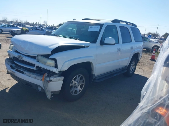 2003 Chevrolet Tahoe Z71 with VIN 1GNEK13T73R225437, listed as a IAAI auction lot 41679198 with 199,048 mi miles. Bid and sale history available at carsss.com. Image 2.