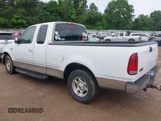 1998 Ford F-150 z VIN 1FTZX176XWNA40696, wystawiony jako IAAI lot #42064621 z przebiegiem 93 452 mil mil oraz . Historia ofert i sprzedaży dostępna na DreamBid. Obrazek 3.