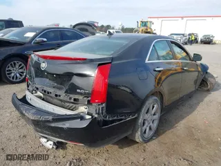 2014 Cadillac ATS Standard AWD with VIN 1G6AG5RX9E0171384, listed as a IAAI auction lot 41836571 with 142,848 mi miles. Bid and sale history available at carsss.com. Image 4.