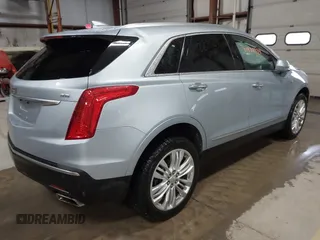 2017 Cadillac XT5 Premium Luxury AWD z VIN 1GYKNERS4HZ306955, wystawiony jako IAAI lot #41932934 z przebiegiem 150 050 mil mil oraz . Historia ofert i sprzedaży dostępna na DreamBid. Obrazek 4.