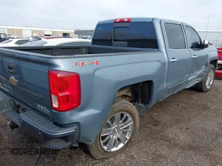 2016 Chevrolet Silverado 1500 High Country with VIN 3GCUKTEC5GG131060, listed as a IAAI auction lot 41108622 with 138,372 mi miles and . Bid and sale history available at DreamBid. Image 4.