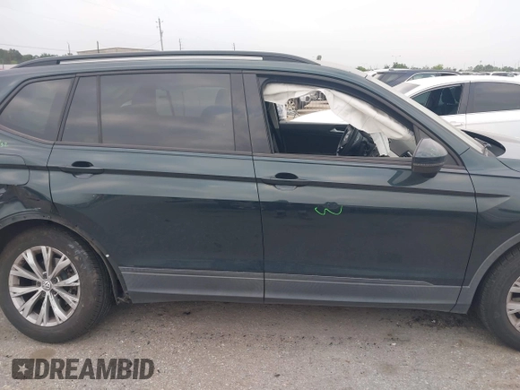 2019 Volkswagen Tiguan S with VIN 3VV1B7AXXKM002312, listed as a IAAI auction lot 42282809 with 80,781 mi miles and . Bid and sale history available at DreamBid. Image 13.