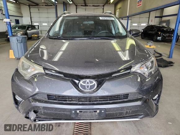 2016 Toyota RAV4 XLE with VIN 2T3RFREV6GW451194, listed as a Copart auction lot 59293325 with 168,739 mi miles and Salvage title. Bid and sale history available at DreamBid. Image 5.