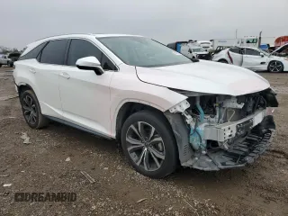 2020 Lexus RX 350L with VIN JTJHZKEA4L2015239, listed as a Copart auction lot 87478044 with 67,006 mi miles and Salvage title. Bid and sale history available at DreamBid. Image 4.