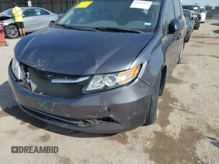 2015 Honda Odyssey LX with VIN 5FNRL5H29FB032327, listed as a IAAI auction lot 42052043 with 153,365 mi miles and . Bid and sale history available at DreamBid. Image 6.
